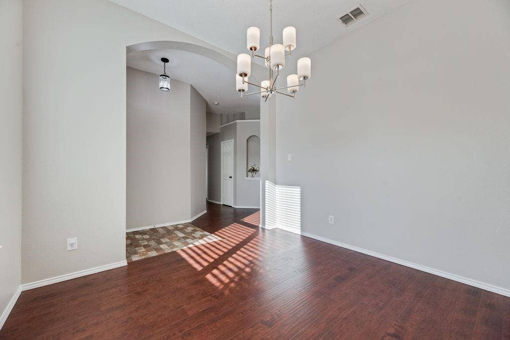 6310 Nueces Bay Drive, Rowlett, TX 75089 living room, dining room, home office, play space. Whatever you need.