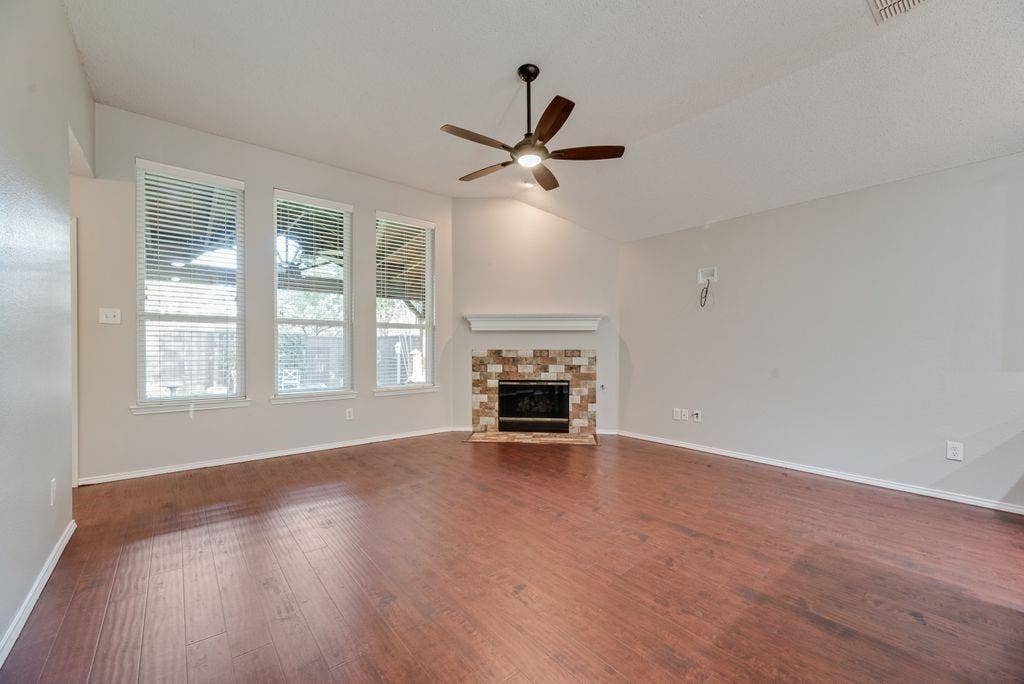 6310 Nueces Bay Drive, Rowlett, TX 75089 Nice, newer windows framing the magnificent outdoor living space.