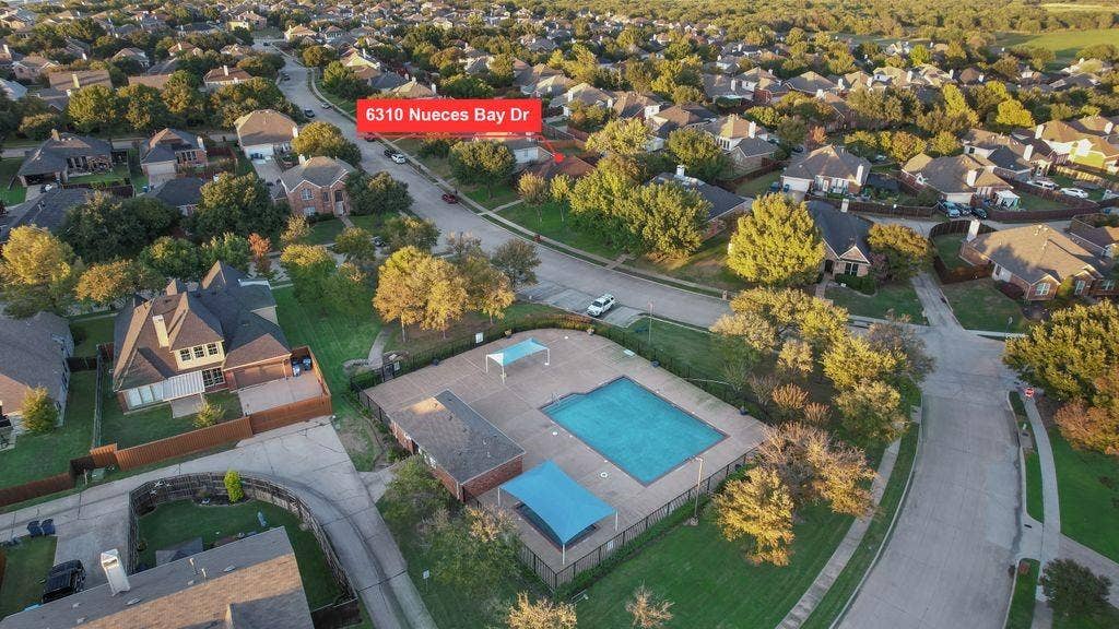 6310 Nueces Bay Drive, Rowlett, TX 75089 Community pool with covered toddler pool, and restrooms.