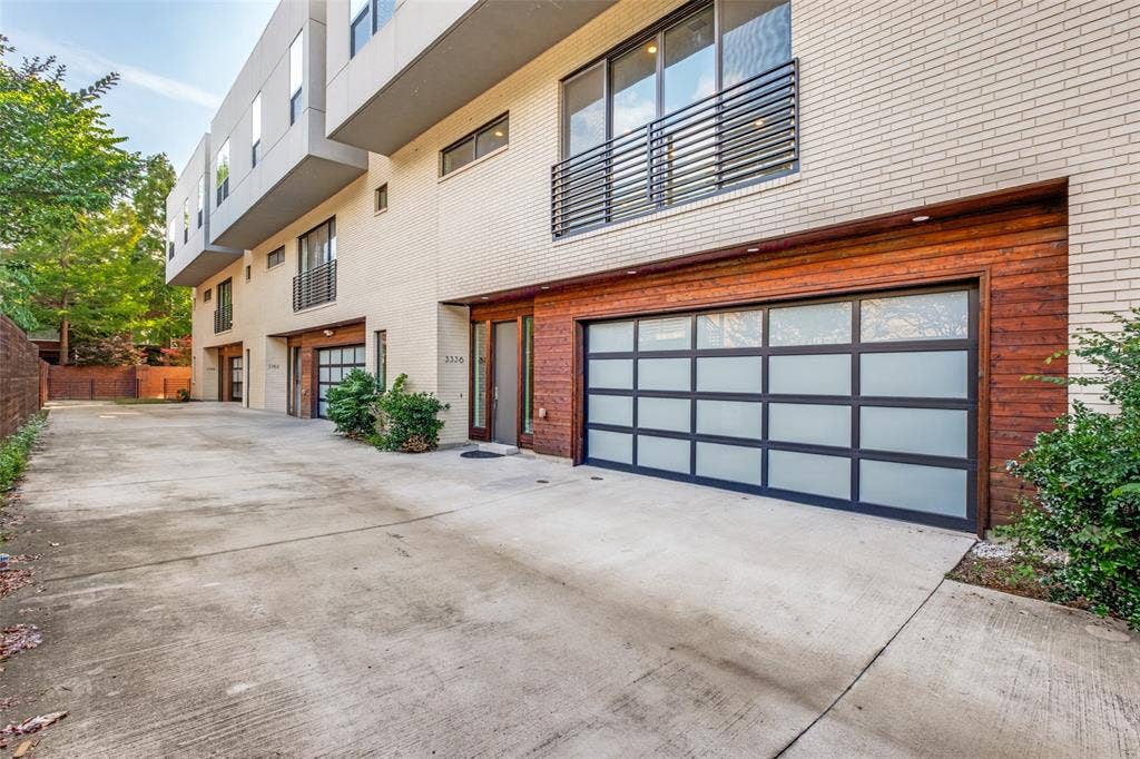 3336 Anchor Court, Dallas, TX 75219 Front facing modern garage door with interior entry