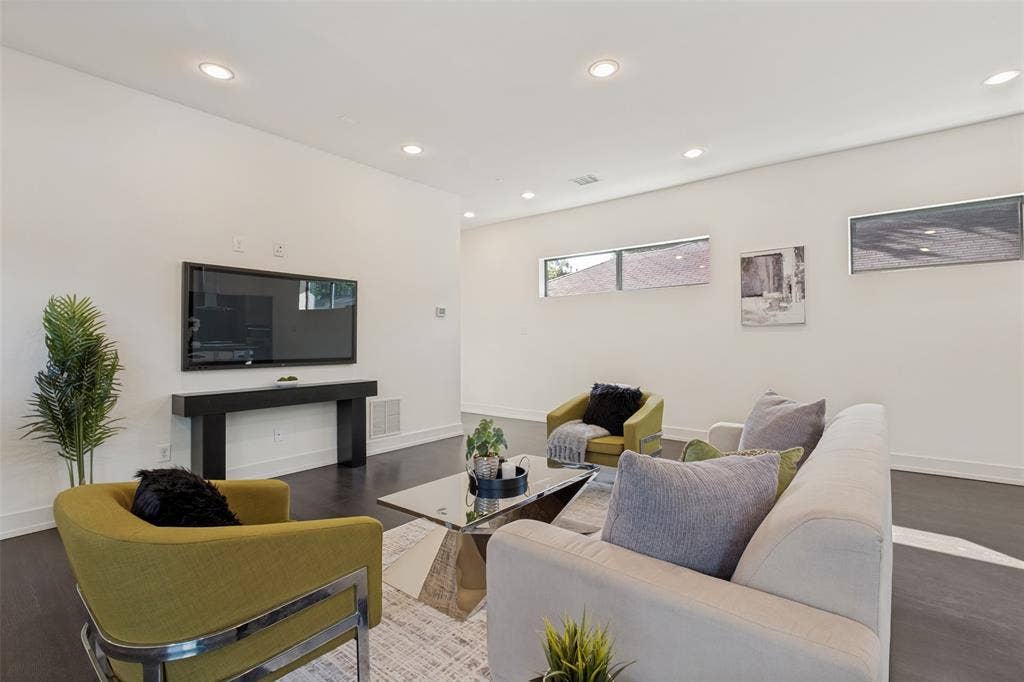 3336 Anchor Court, Dallas, TX 75219 Spacious interior featuring dark wood-finish flooring, recessed lighting, and horizontal clerestory windows