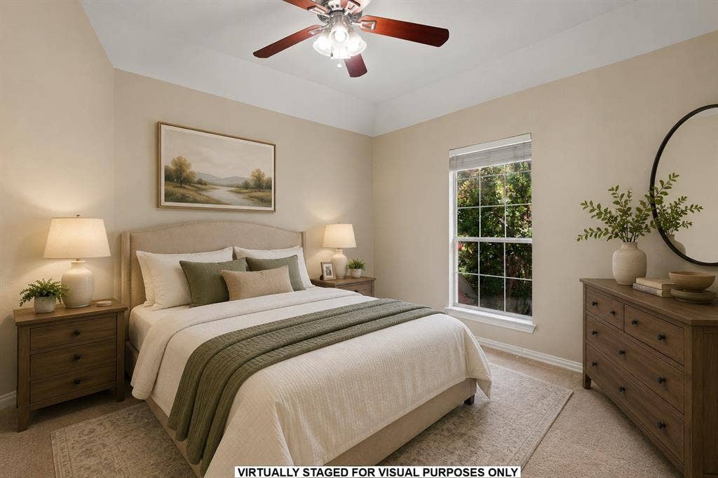 1110 Wedge Hill Road, McKinney, TX 75072 Room featuring a tray ceiling, neutral wall tones, carpeting, and a multi-blade ceiling fan with integrated lighting