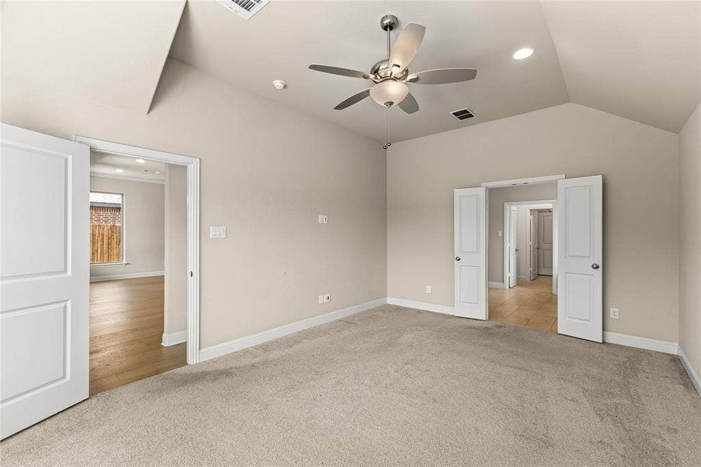408 Abbott Lane, Waxahachie, TX 75165 Vaulted ceiling featuring a central multi-blade ceiling fan with integrated lighting and recessed ceiling lights