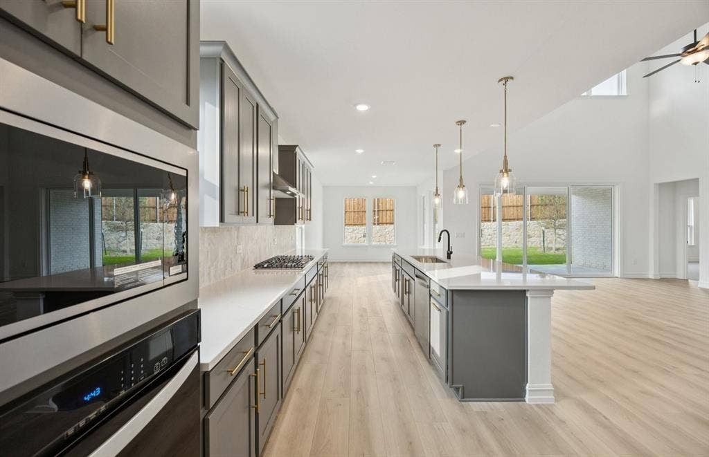 1541 Clouseau Lane, Celina, TX 75009 *Floorplan representation, not actual home - Large island gathering room and dining areas overlooking