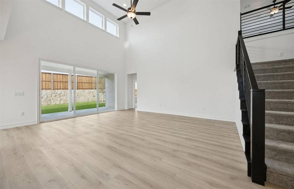 1541 Clouseau Lane, Celina, TX 75009 *Floorplan representation, not actual home - Spacious gathering room with large windows
