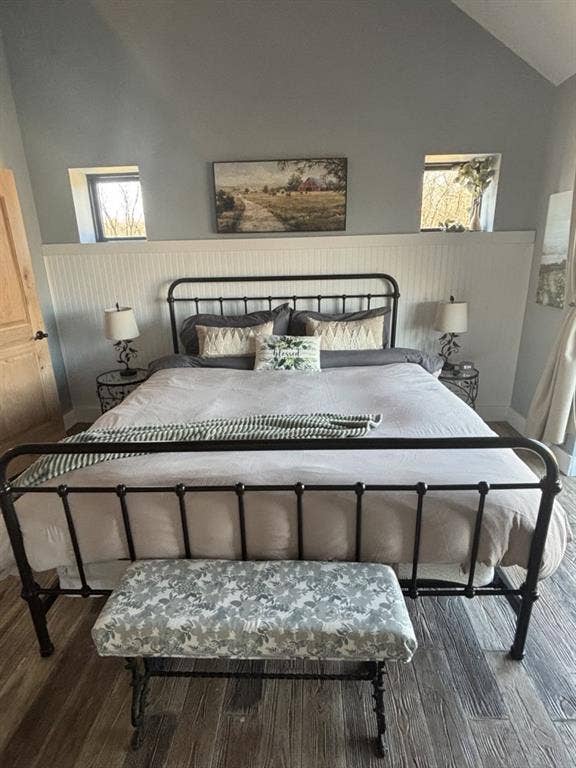 1794 County Road 4309 N, Greenville, TX 75401 Vaulted ceiling featuring beadboard wainscoting, dual transom windows, and wood-finish flooring