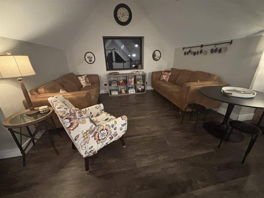 1794 County Road 4309 N, Greenville, TX 75401 Vaulted ceilings, wood-finish flooring, and a rectangular window
