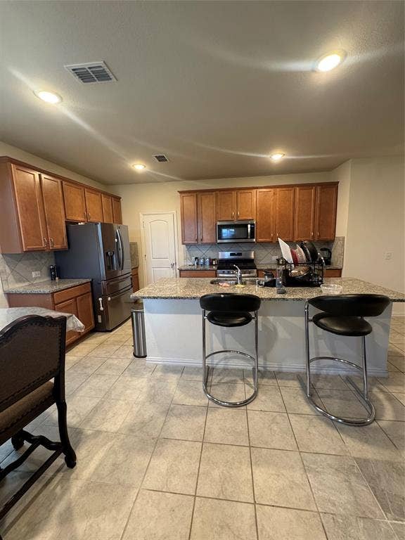 Island bar area. All appliances included.