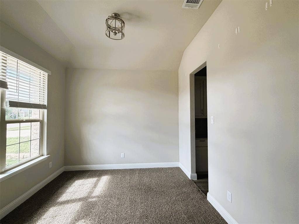 3728 Walnut Ridge Drive, Grand Prairie, TX 76065 Dining room with butler's pantry at right for easy serving.