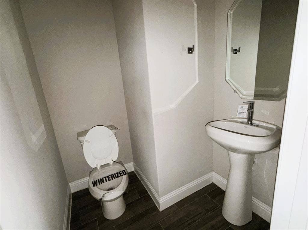 3728 Walnut Ridge Drive, Grand Prairie, TX 76065 Guest powder room provides stylish convenience.