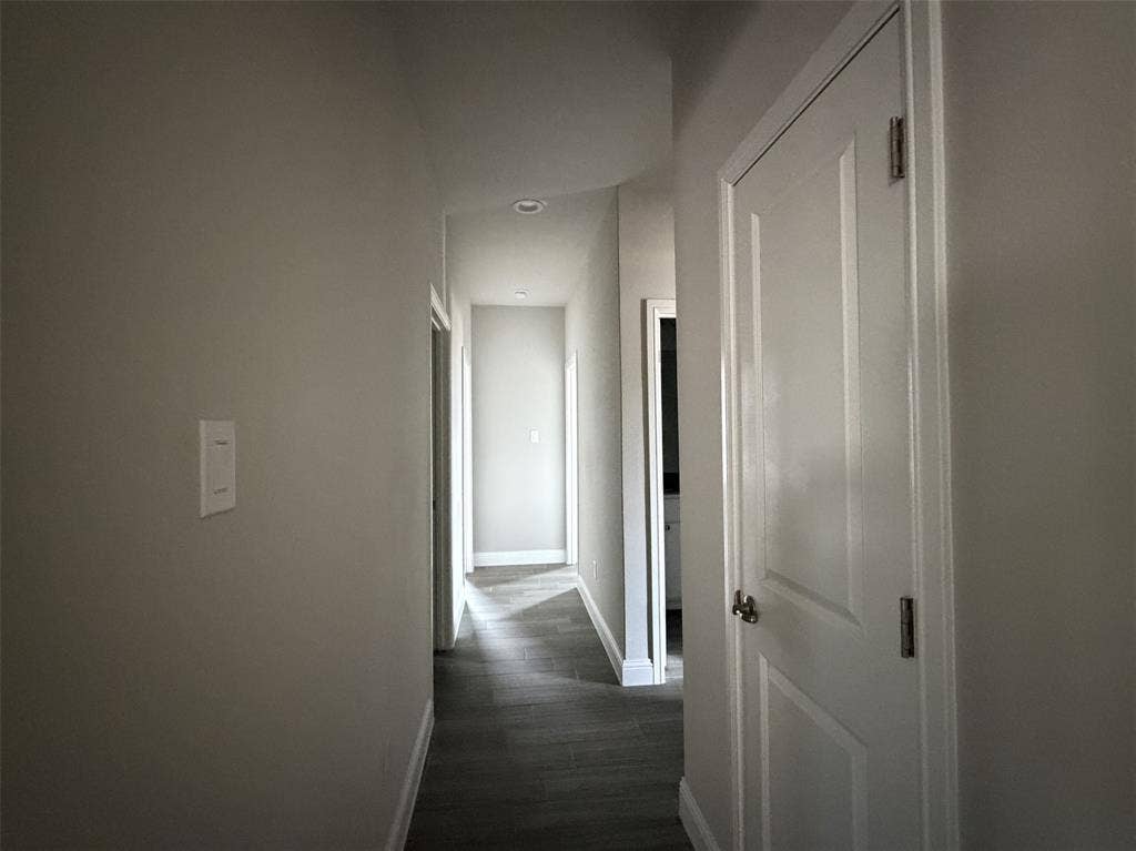 3728 Walnut Ridge Drive, Grand Prairie, TX 76065 Hallway leads to additional bedrooms and bath.