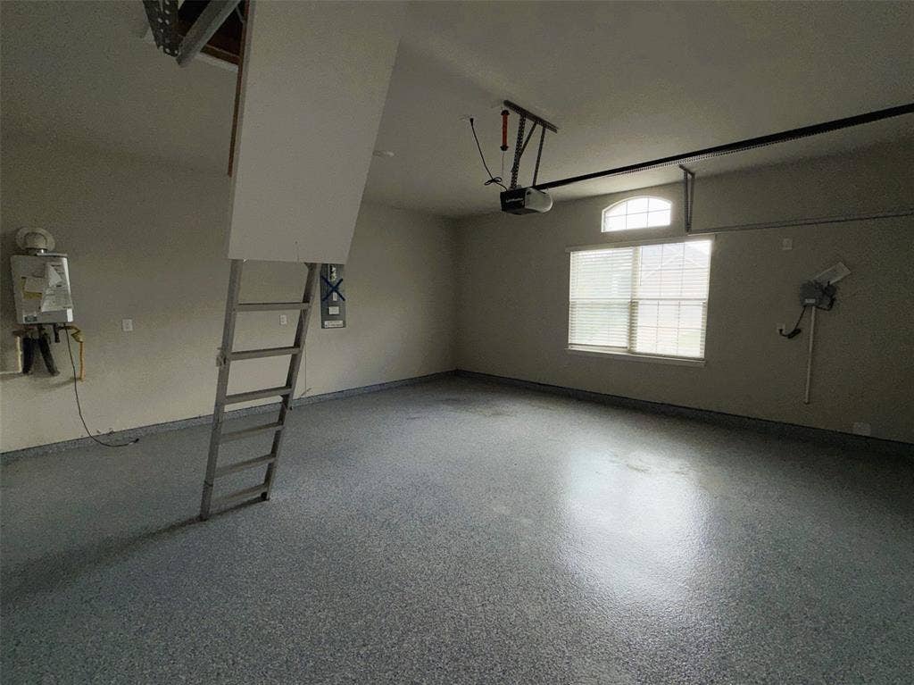 3728 Walnut Ridge Drive, Grand Prairie, TX 76065 Pull-down stairs provide easy access to storage in the attic.