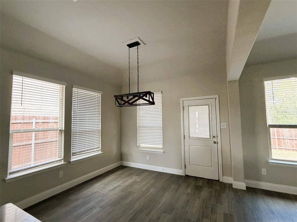 3728 Walnut Ridge Drive, Grand Prairie, TX 76065 Plenty of natural light flood the area. Step outside to the covered patio.