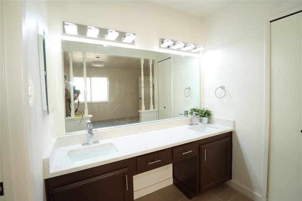 1518 Burgundy Street, Garland, TX 75040 New dual undermount sinks, stone-finish countertops, and beautiful fixtures!