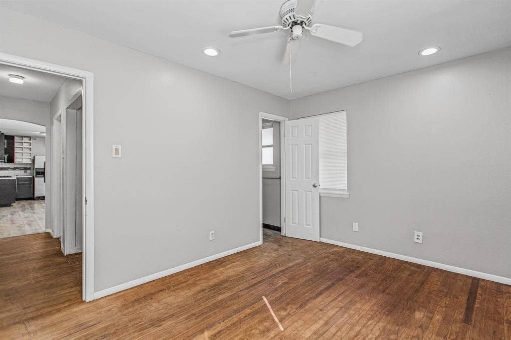 1220 Colfax Circle, Richardson, TX 75080 Room featuring wood-finish flooring, recessed lighting, and a white ceiling fan
