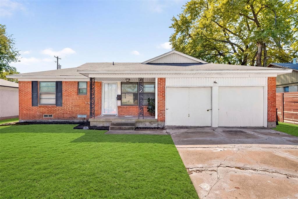 3532 Hilton Drive, Mesquite, TX 75150 Single-story brick exterior featuring a covered front porch with decorative iron columns, an attached two-car garage, and a concrete driveway