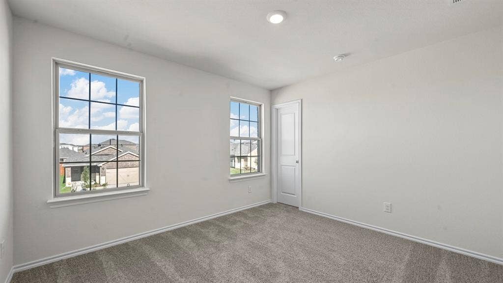 5727 Sunshine Lane, Crandall, TX 75114 Recessed ceiling lighting, carpeted flooring, two windows with grids, and a solid interior door