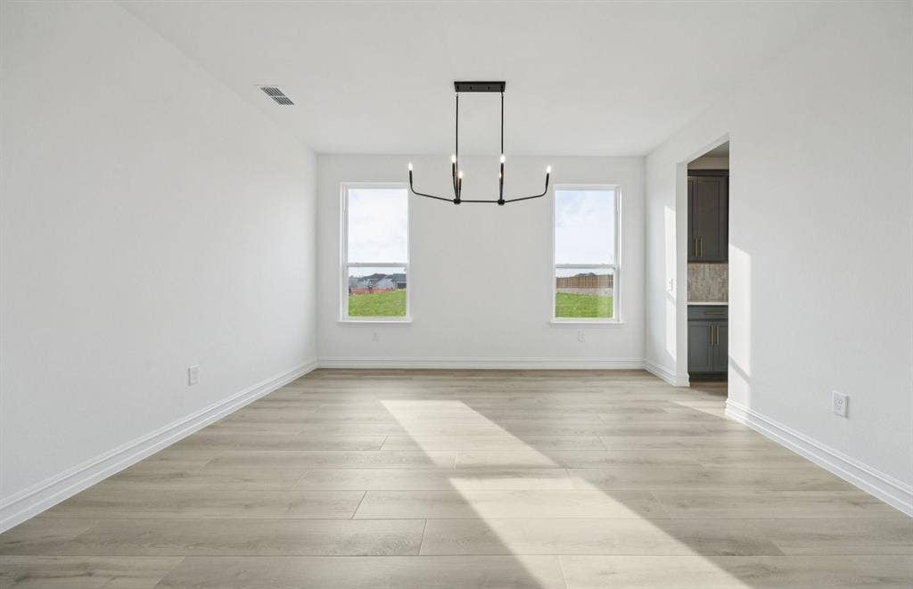 2634 Creekdale Drive, Celina, TX 75009 *Floorplan representation, not actual home - Formal dining room with large windows
