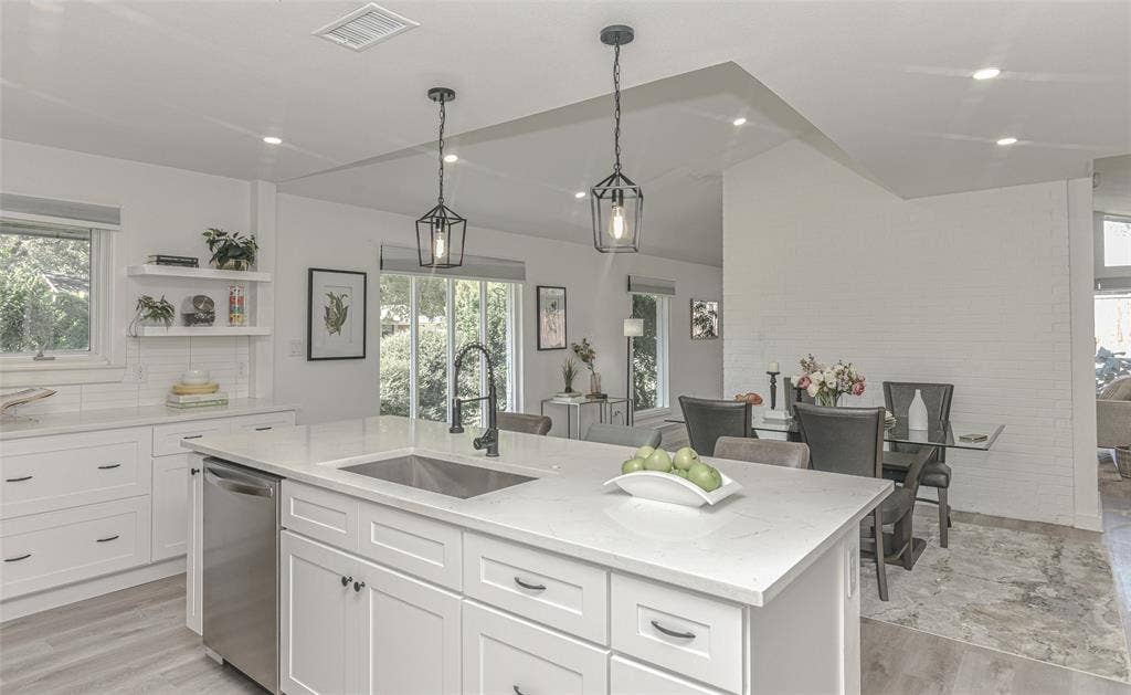 13936 Tanglewood Place, Farmers Branch, TX 75234 The Kitchen has room for friends, family and food to gather for entertaining