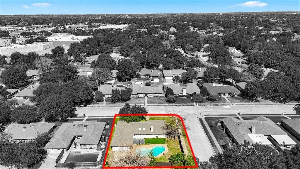 1900 Ports O Call Drive, Plano, TX 75075 Aerial view of property featuring a corner lot, a swimming pool, and mature trees