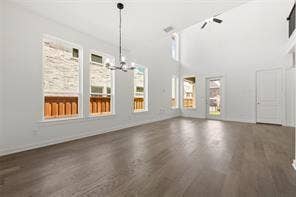 15638 Kestrel Mews, Frisco, TX 75035 Vaulted ceilings, wood-finish flooring, multi-pane windows, and a multi-arm chandelier