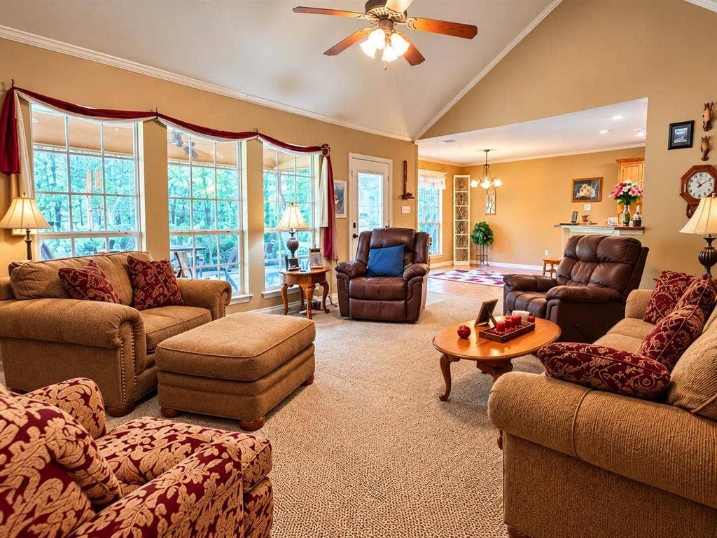 9031 Mallard Way, Larue, TX 75770 Vaulted ceilings, large grid windows, and an overhead ceiling fan, featuring a neutral carpet finish
