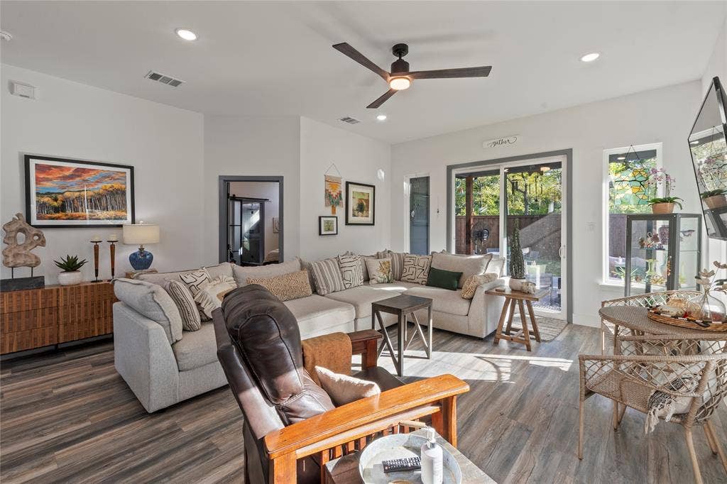 6113 Ottawa Trail, Mabank, TX 75156 Living area featuring wood-finish flooring, recessed lighting, a ceiling fan with integrated lighting, and a sliding glass door