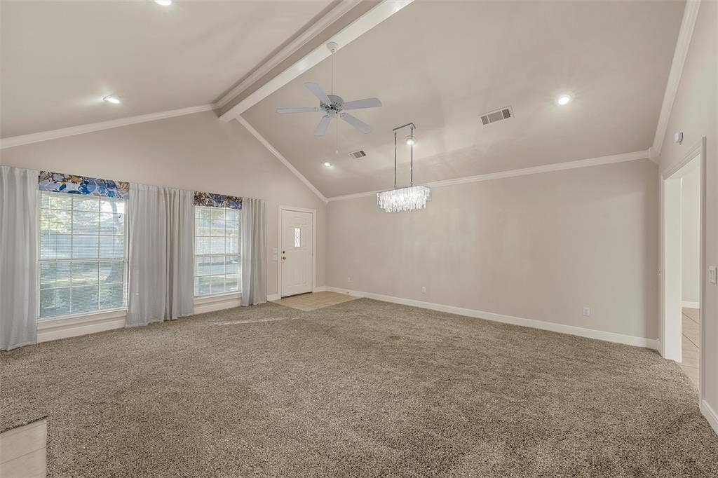 201 Pecan Village Circle, Waco, TX 76710 Vaulted ceilings featuring a chandelier, recessed lighting, and a ceiling fan, complemented by windows with natural light