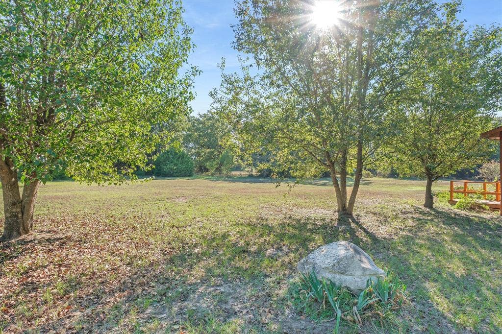 15993 County Road 4059, Kemp, TX 75143 Open areas and woods describe this property