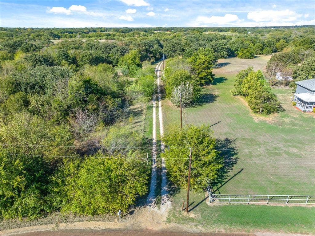 15993 County Road 4059, Kemp, TX 75143 Hidden among the trees down a long driveway