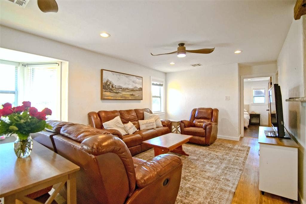 325 & 321 Grassy Way, Elm Mott, TX 76640 Living area featuring wood-finish flooring, recessed lighting, and a multi-blade ceiling fan