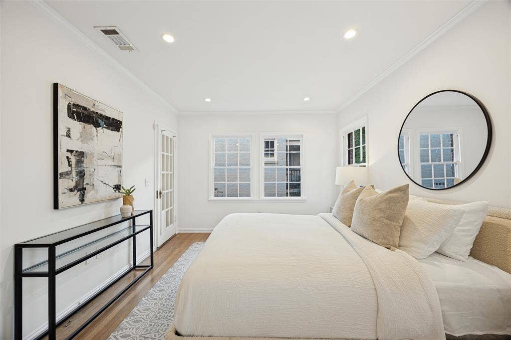 7011 Hammond Avenue, Dallas, TX 75223 Interior space featuring recessed lighting, wood-finish flooring, multi-pane windows, and a glass-paneled door