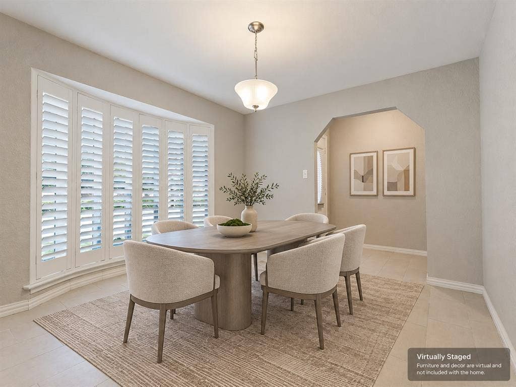 900 Lexington Drive, Plano, TX 75075 Bay window with plantation shutters, neutral tile flooring, and a glass pendant light fixture