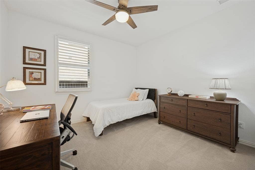 3417 Paintbrush Path, Melissa, TX 75454 Neutral carpeting, white interior paint, ceiling fan with light kit, and plantation shutter window coverings