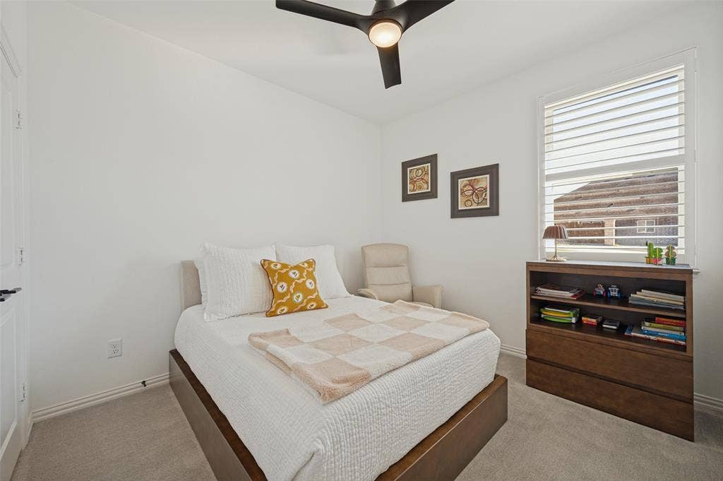 3417 Paintbrush Path, Melissa, TX 75454 Neutral-toned wall-to-wall carpeting, window fitted with adjustable plantation shutters, and a central ceiling fan with integrated lighting