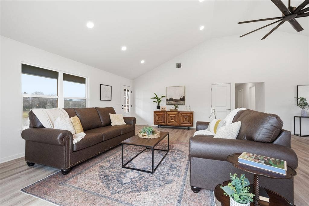 2303 Pilgrim Lane, Lorena, TX 76655 Living area featuring a vaulted ceiling, wood-finish flooring, recessed lighting, and a multi-blade ceiling fan