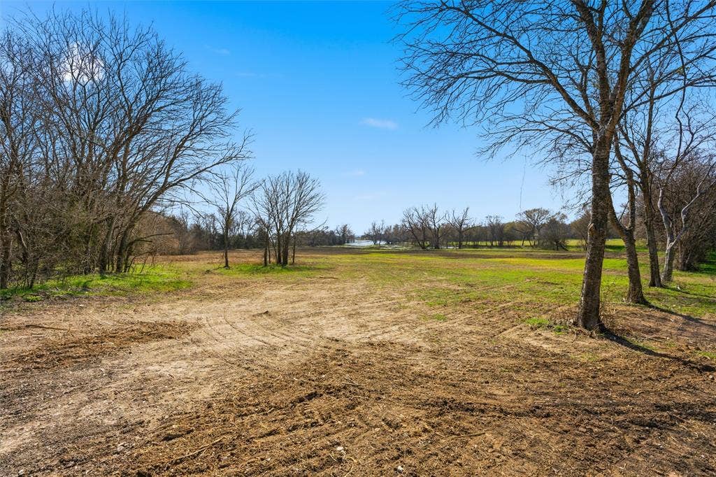 2303 Pilgrim Lane, Lorena, TX 76655 Expansive level lot featuring cleared acreage and mature trees