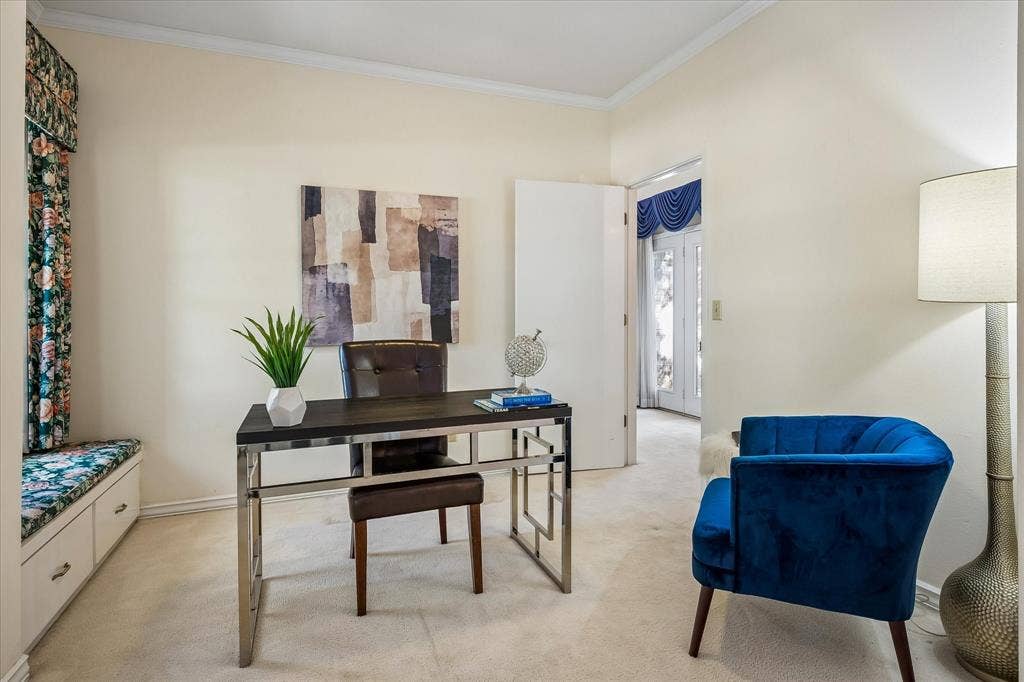 2926 N Saint Andrews Drive, Richardson, TX 75082 The office is located right off the primary bedroom has a large window with a sitting area underneath with additional storage.