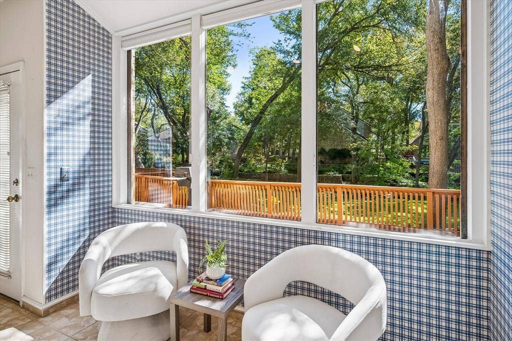 2926 N Saint Andrews Drive, Richardson, TX 75082 Truly a wonderful view of the backyard which the breakfast area is currently being displayed as a sitting area, but could easily be replaced with a kitchen table and chairs.