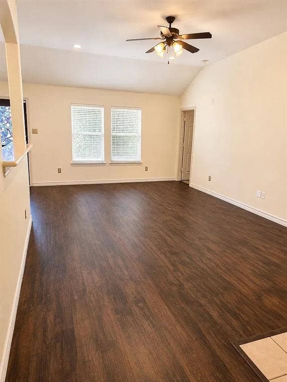 1207 Fox Trail Drive, Allen, TX 75002 Vaulted ceilings, wood-finish flooring, dual windows, and a ceiling fan with integrated lighting