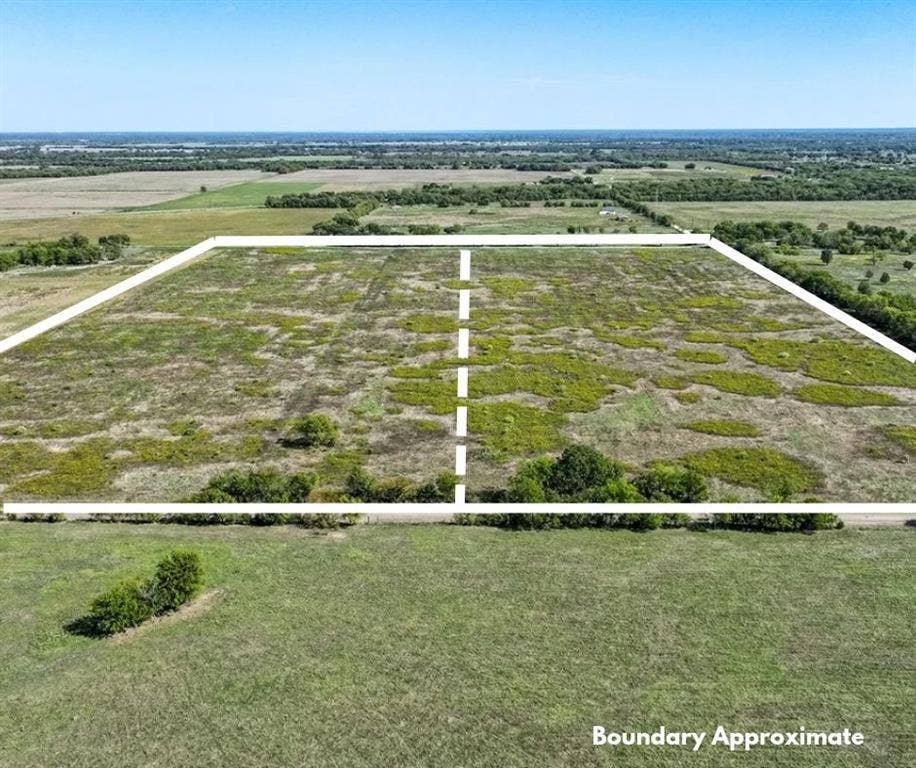 0 County Road 4604, Commerce, TX 75428 Expansive acreage featuring level topography, open pastureland, and established perimeter vegetation