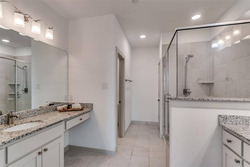 1423 Lamb Drive, Plano, TX 75075 Full luxury ensuite primary bath, walk in closet, shower and, vanities and make up center