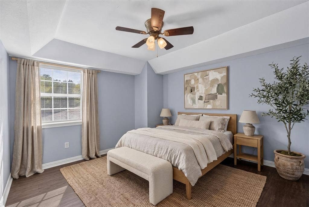 1708 Timber View Drive, Tyler, TX 75703 Tray ceiling, wood-finish flooring, and a multi-light ceiling fan