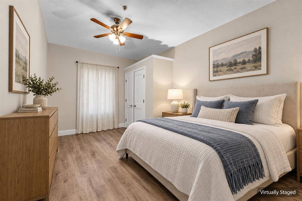 2410 S 2nd Street, #625, Waco, TX 76706 Wood-finish flooring, neutral wall tones, multi-light ceiling fan, and built-in closet with paneled doors