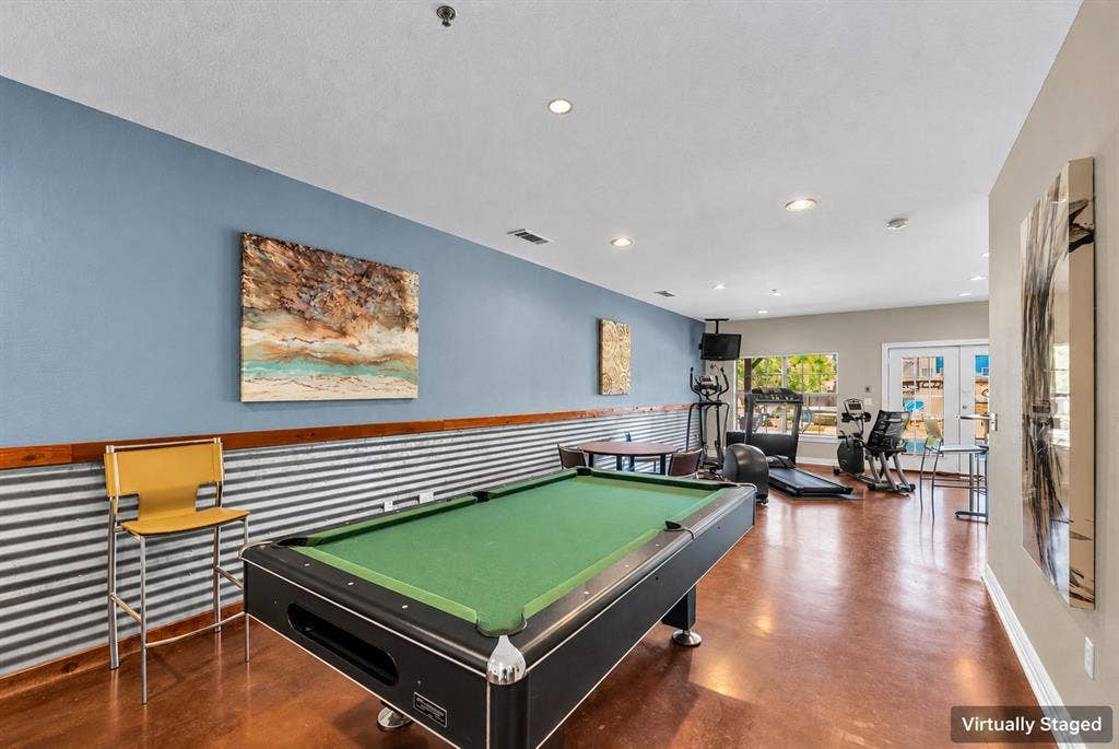 2410 S 2nd Street, #625, Waco, TX 76706 Interior space featuring corrugated metal wainscoting, polished concrete flooring, recessed lighting, and double glass-pane doors