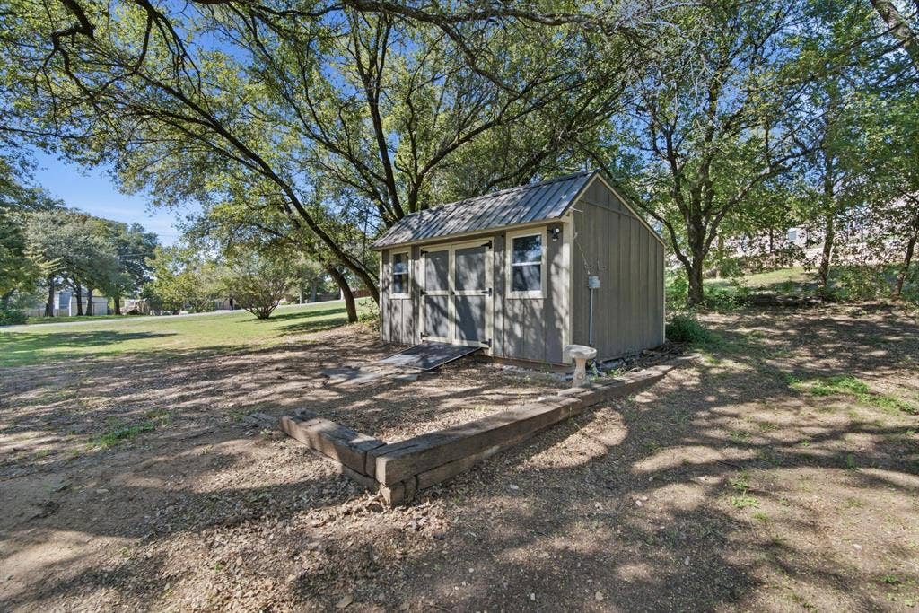 404 Aqua Vista Drive, Granbury, TX 76049 Storage Shed with 30 Amp RV Hook Up
