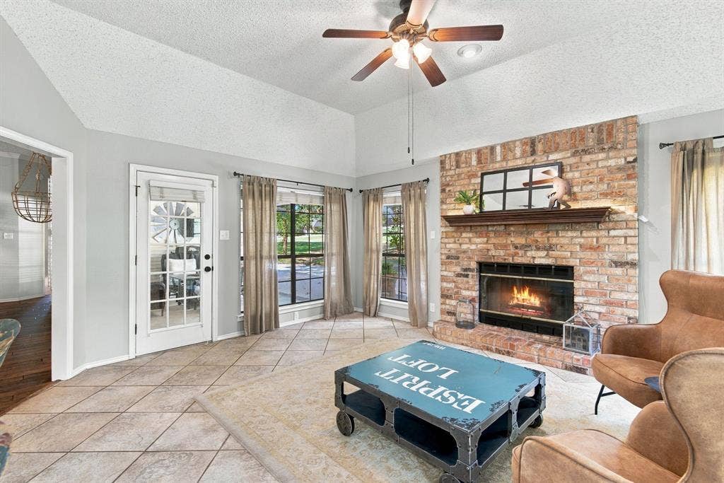 404 Aqua Vista Drive, Granbury, TX 76049 2nd Living Area, wood burning fireplace,