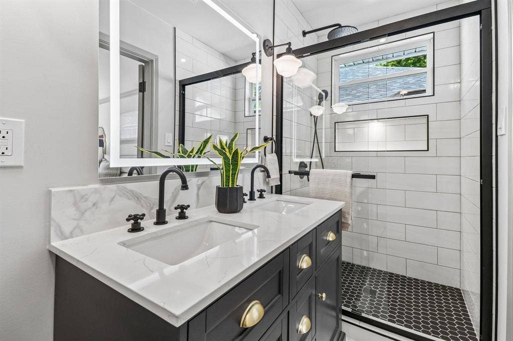 Dual vanity with white countertop and integrated sinks