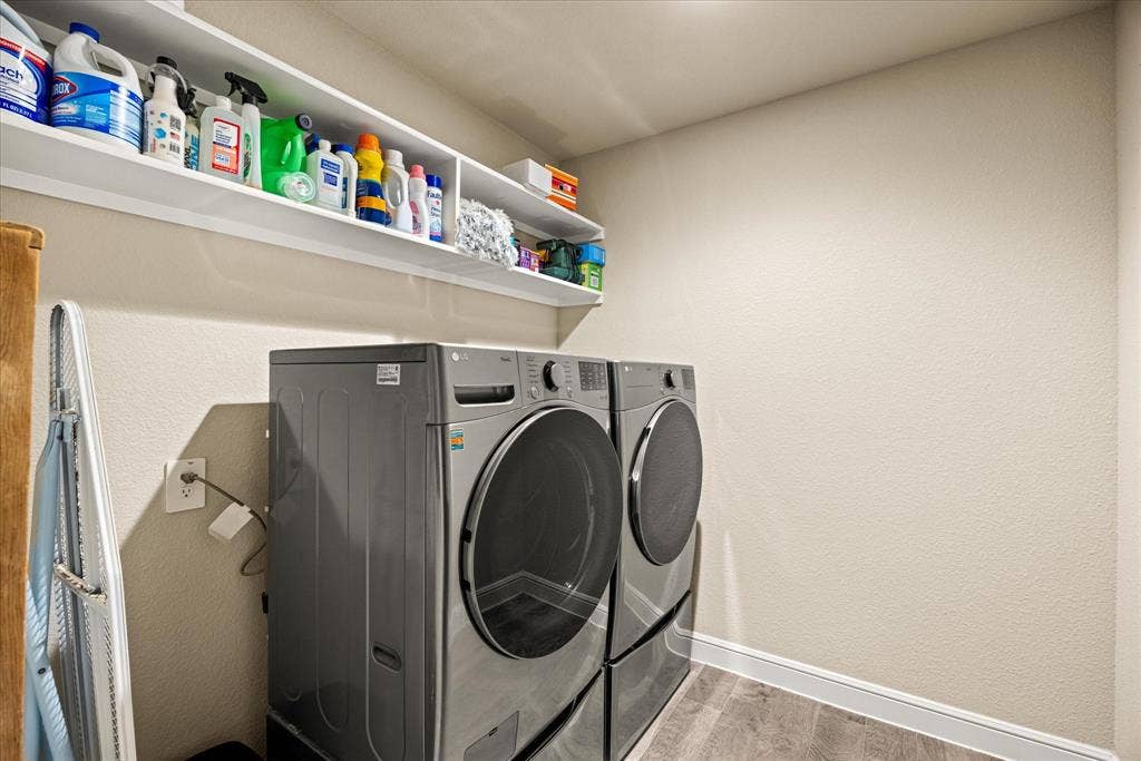 4119 Cornerstone Circle, Granbury, TX 76048 Good sized laundry room with shelving.