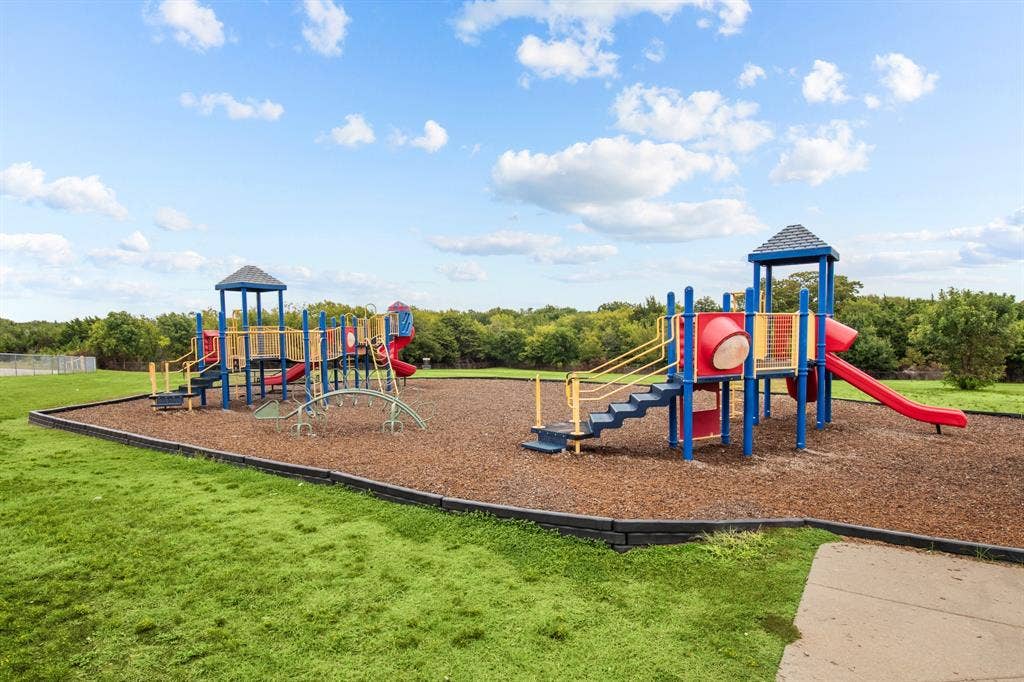 151 E Little Creek Road, #B-01, Cedar Hill, TX 75104 Little Creek playground view. Community view, not the interior of unit B-01.